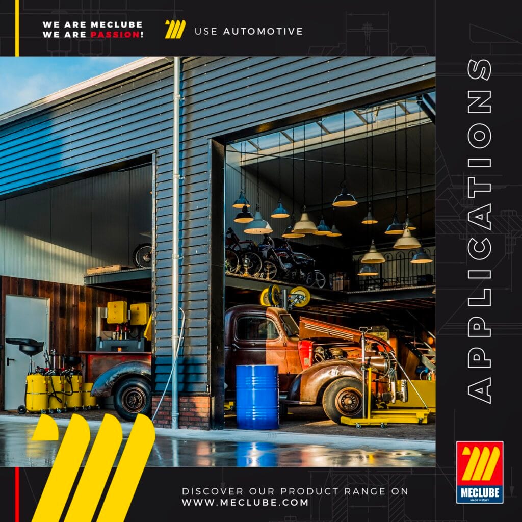 MecLube automotive lubrication equipment in a service garage with oil drums, pumps, and maintenance carts