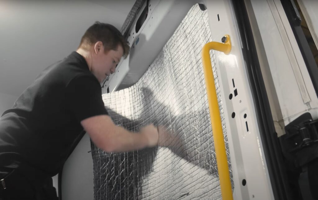 Legend TempShield van insulation system being installed on cargo-area walls and ceiling