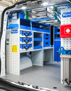 Full-size regular-wheelbase electrician van shelving with removable cases, drawers, open shelves, and lower storage