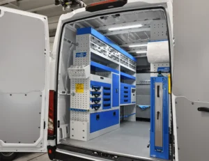 Mercedes-Benz Sprinter 144 high-roof electrician van shelving with open shelves, drawers, and lower cabinets