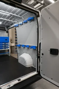 RAM ProMaster electrician van passenger-side wall with equipment holders and open cargo-floor space