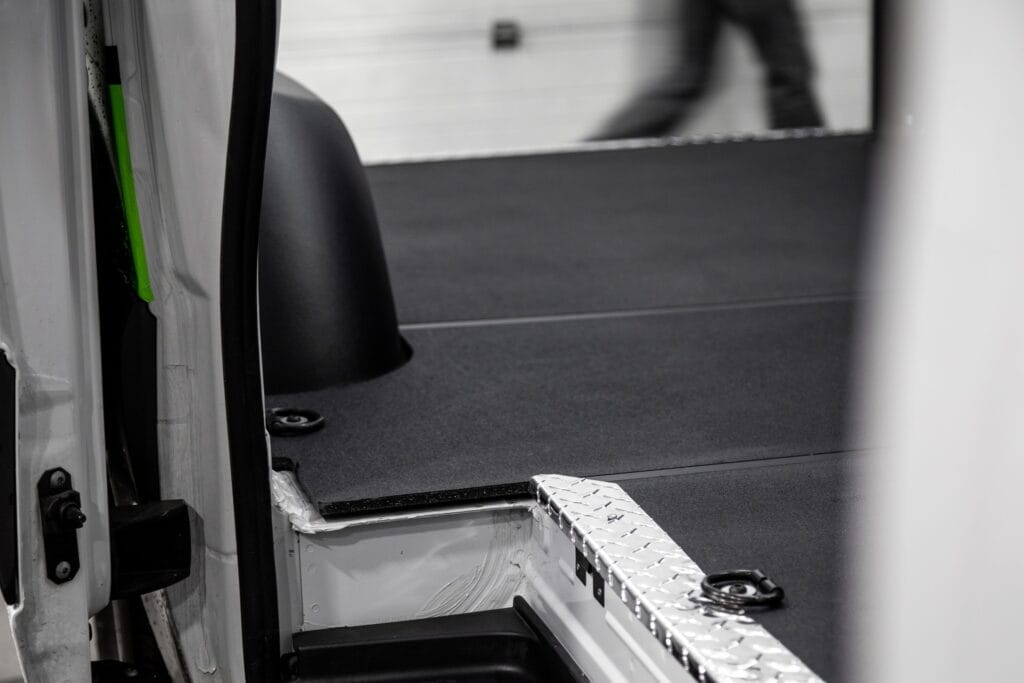 Legend Fleet Solutions videos showing cargo van flooring and interior protection shown inside a commercial van