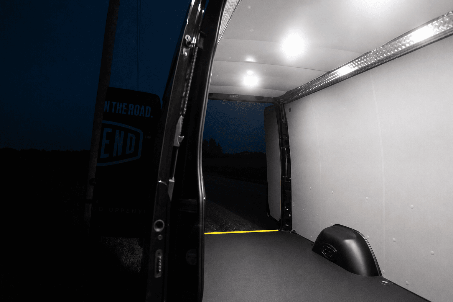 Pro Cargo interior and vehicle protection systems image showing Legend Fleet floor, wall, ceiling, and wheel well protection for commercial van durability and workflow.