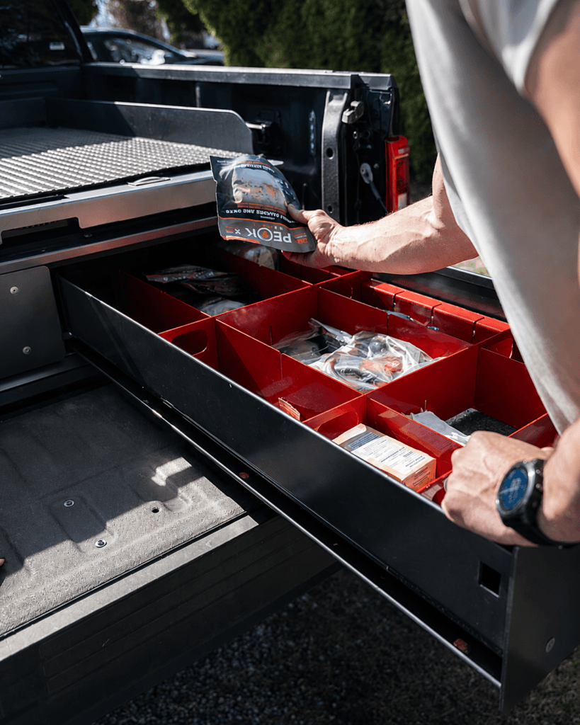 Pro Cargo cargo management and access systems image showing Cargo Ease-style truck bed drawer storage for organized parts, tools, equipment, and workflow-focused cargo access.